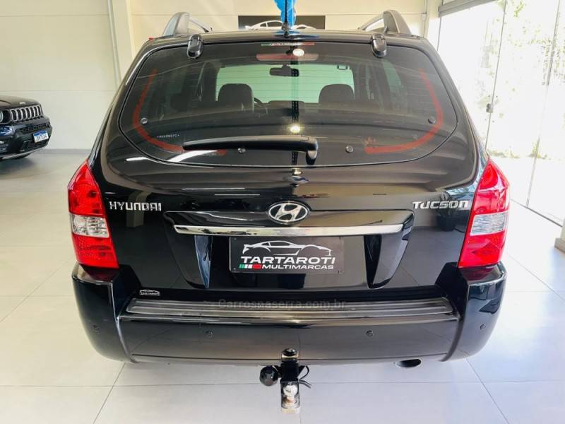 HYUNDAI - TUCSON - 2009/2010 - Preta - R$ 43.990,00