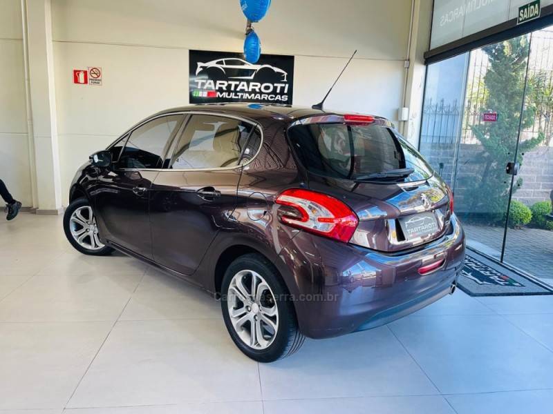 PEUGEOT - 208 - 2014/2015 - Marrom - R$ 50.990,00