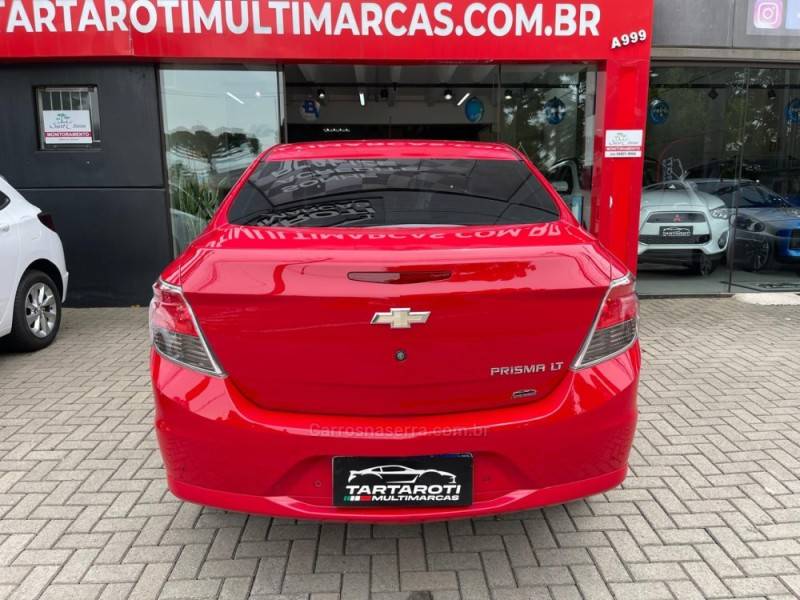 CHEVROLET - PRISMA - 2015/2016 - Vermelha - R$ 57.990,00