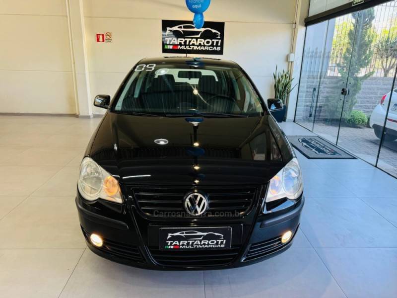 VOLKSWAGEN - POLO - 2008/2009 - Preta - R$ 34.990,00